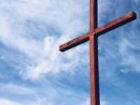 a brown wooden cross