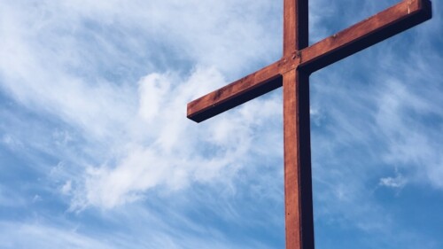 a brown wooden cross