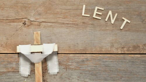 a piece of wood with the word lent on it